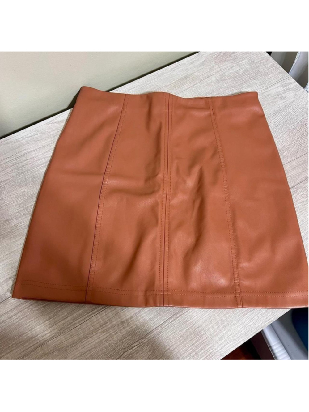 Altar’d State Mini Skirt
Size Small
Light Brown Color
Faux Leather
100% Polyes